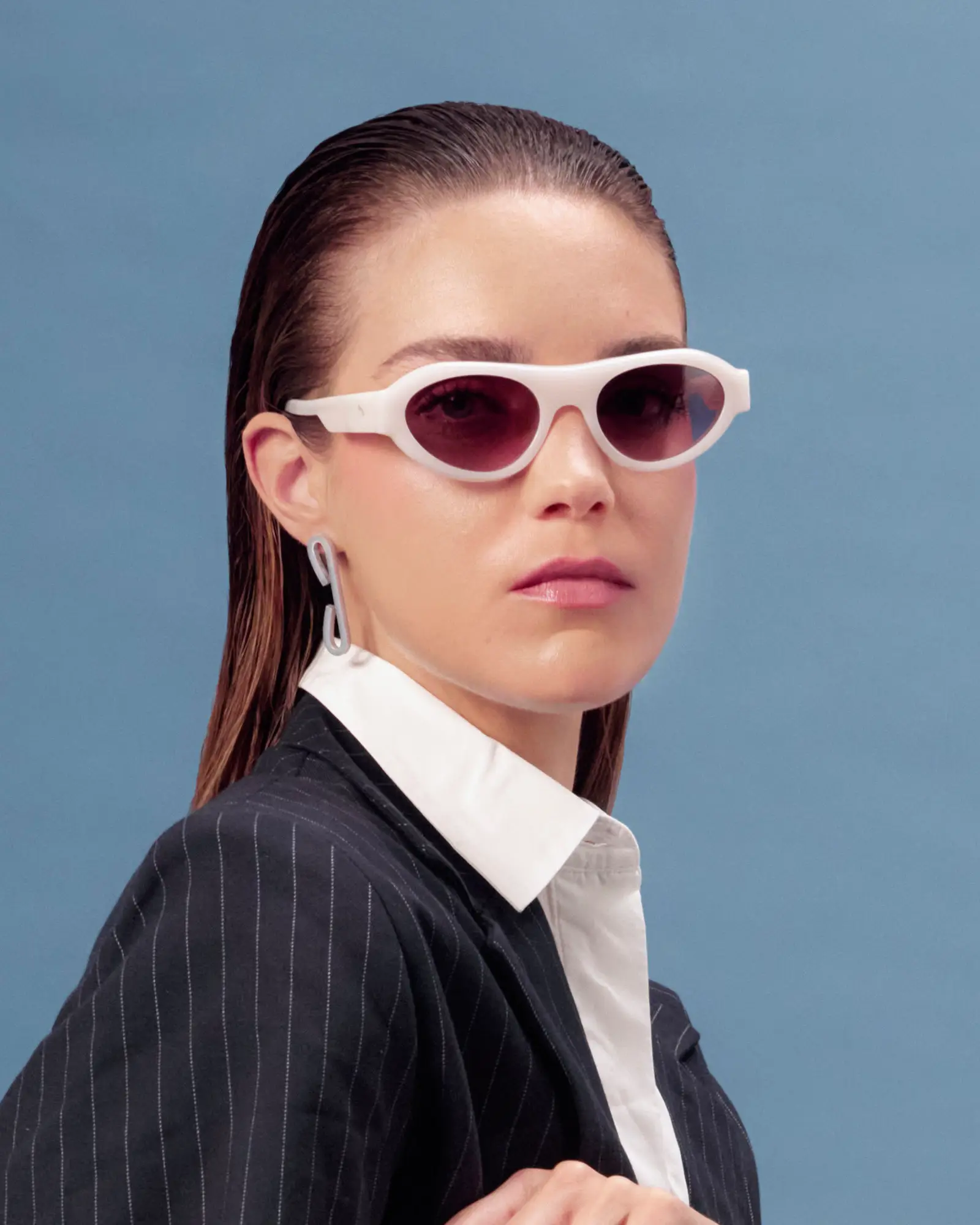 face a face woman sunglasses at st kilda eyecare